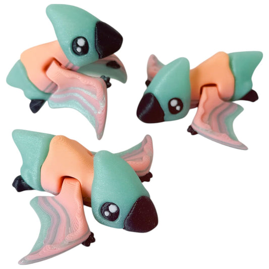 5-Pack Mini Pterodactyl Critters Figurines – Articulated Flying Dino Fidget Toys for Desk, Shelf, or Collectible Display – Cute Flexi Dinosaur Models with Pastel Wings – 3D Printed in Canada