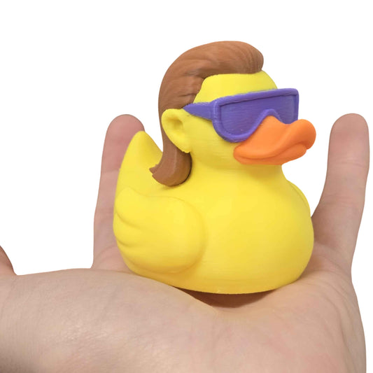 Mullet Duck Figurine – Retro Duck with 80s-Style Sunglasses & Flowing Mullet – Funny Desk Decor or Gift for Nostalgia Fans – 3D Printed in Canada