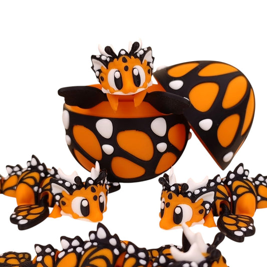 Articulated Butterfly Dragon with Container Egg Shell – Articulated Monarch-Inspired Fantasy Figurine for Display or Fidgeting – Orange Dragon Collectible Model – 3D Printed in Canada
