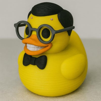 Nerd Duck Figurine – Geeky Rubber Duck Style Decor with Glasses, Bowtie & Smile – Funny Shelf Accessory for Home or Office – Quirky Collectible Gift for Adults & Teens – 3D Printed in Canada — 3D Printed Collectible by 3DCentral