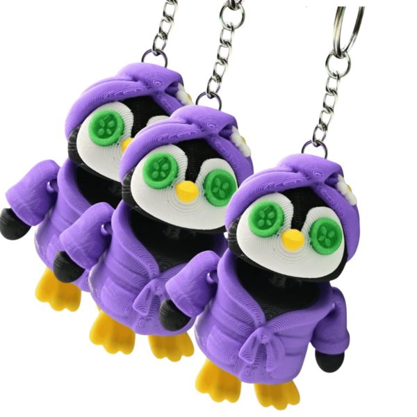 Trio de porte-clés pingouins au spa