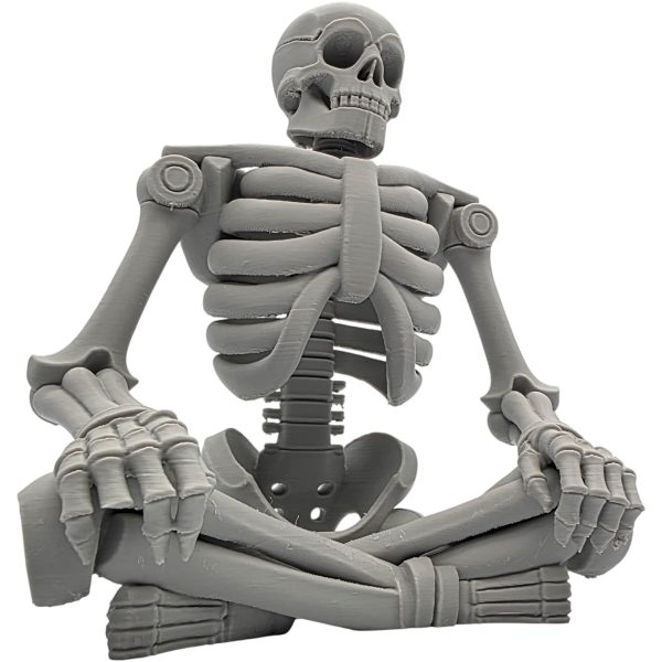 Figurine de squelette assis costaud