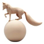 Fox Balancing on a Ball Sculpture