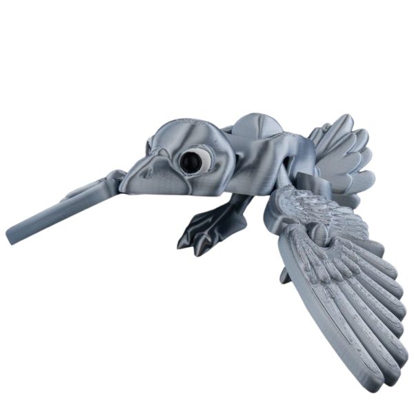 Figurine articulée corbeau battant des ailes