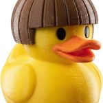 Bowl Cut Duck Figurine – Funny Retro Rubber Duck Collectible with Brown Hair Helmet – Quirky Gift for Adults, Desk Décor or Display Shelf Accent – 3D Printed in Canada