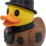 Broke Duck Figurine – Funny Collectible Duck with Hat & Scarf, Quirky Desk Companion, Unique Shelf Decor for Duck Lovers