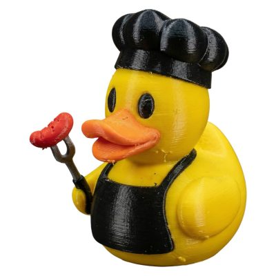 Grillmaster Duck Figurine – BBQ Chef Rubber Duck with Sausage & Apron – Funny Desk Decor, Collector Display, Gift for BBQ Lovers – 3D Printed in Canada — 3D Printed Collectible by 3DCentral