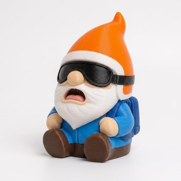Figurine de gnome barbu avec sac à dos