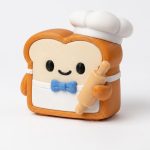 Baker Toast Collectible Figurine - Delightful Chef Bread Character with Rolling Pin and Bowtie Desk Accent for Home or Office Decor - Unique Gift for Cooking Enthusiasts - 3D Printed in Canada
