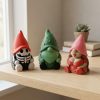 Ensemble de figurines de gnomes squelettes