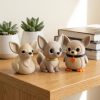 Lot de figurines canard, renard et pingouin