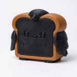 Black Raven Toast Collectible Figurine - Striking Black and Brown Desk Accent for Home or Office Decor - Unique Gift for Collectors - 3D Printed in Canada