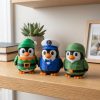 Ensemble varié de figurines de pingouin