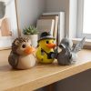 Ensemble de figurines de canards hérisson et journaliste