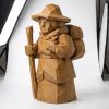 Figurine voyageur Le voyage commence sculptée bois