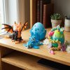 Figurine de dragon faucheur