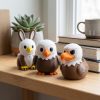 Lot de figurines aigle, lapin, pingouin et canard