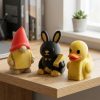 Ensemble de figurines gnome doré, lapin et canard