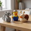 Lot de figurines de canards gargouille, fermier et escargot