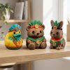 Ensemble de figurines de collection canard prêtre aztèque