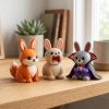 Ensemble figurines renard et lapin orange