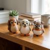 Ensemble de figurines de pingouins races de chiens