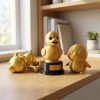 Ensemble de figurines canard doré trophée, ours et pingouin