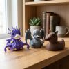 Ensemble de figurines de canards Quackthulhu et ange funéraire