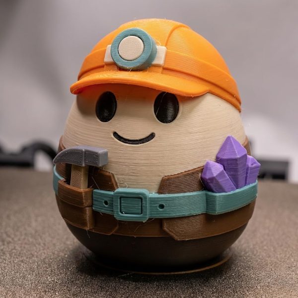 Figurine œuf géologue