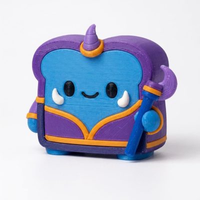 Baku Toast Collectible Figurine - Colorful Fantasy Character with Purple and Blue Detailing - Unique Desk Decor and Eye-Catching Shelf Display Piece for Adults - 3D Printed in Canada