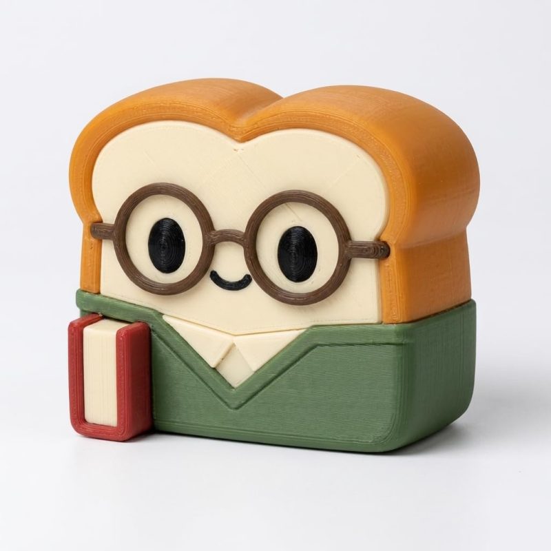 Bookworm Toast Collectible Figurine - Unique Desk Decor for Book Lovers – 3D Printed in Canada