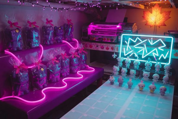 Kawaii 3D-printed figurines in synthwave neon, wrapped gifts on one side and a catalogue grid on the other